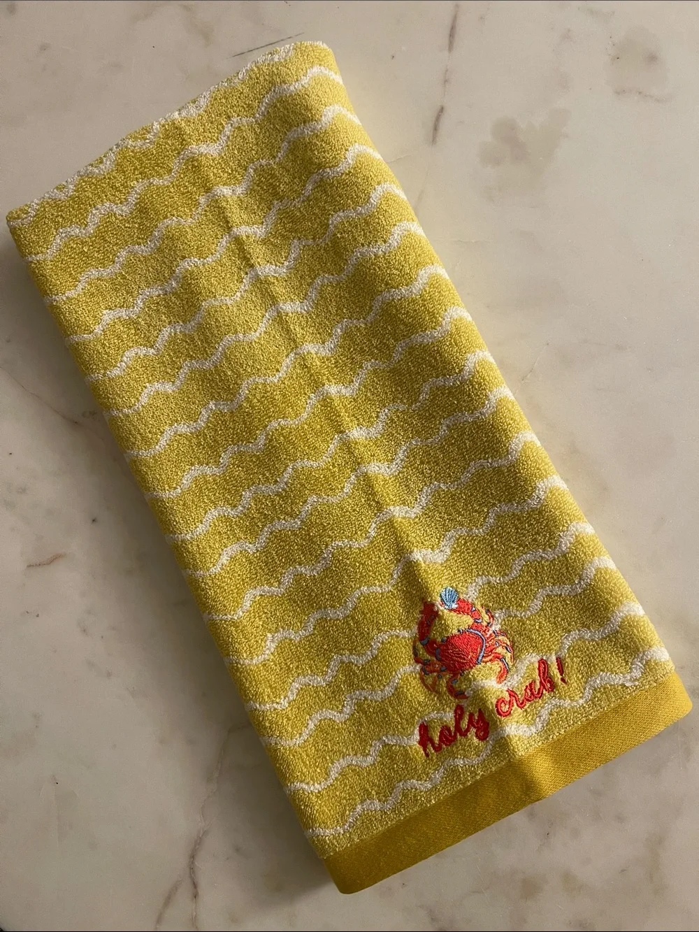 Holy Crab Icon Embroidered Hand Towel from Anthroplologie